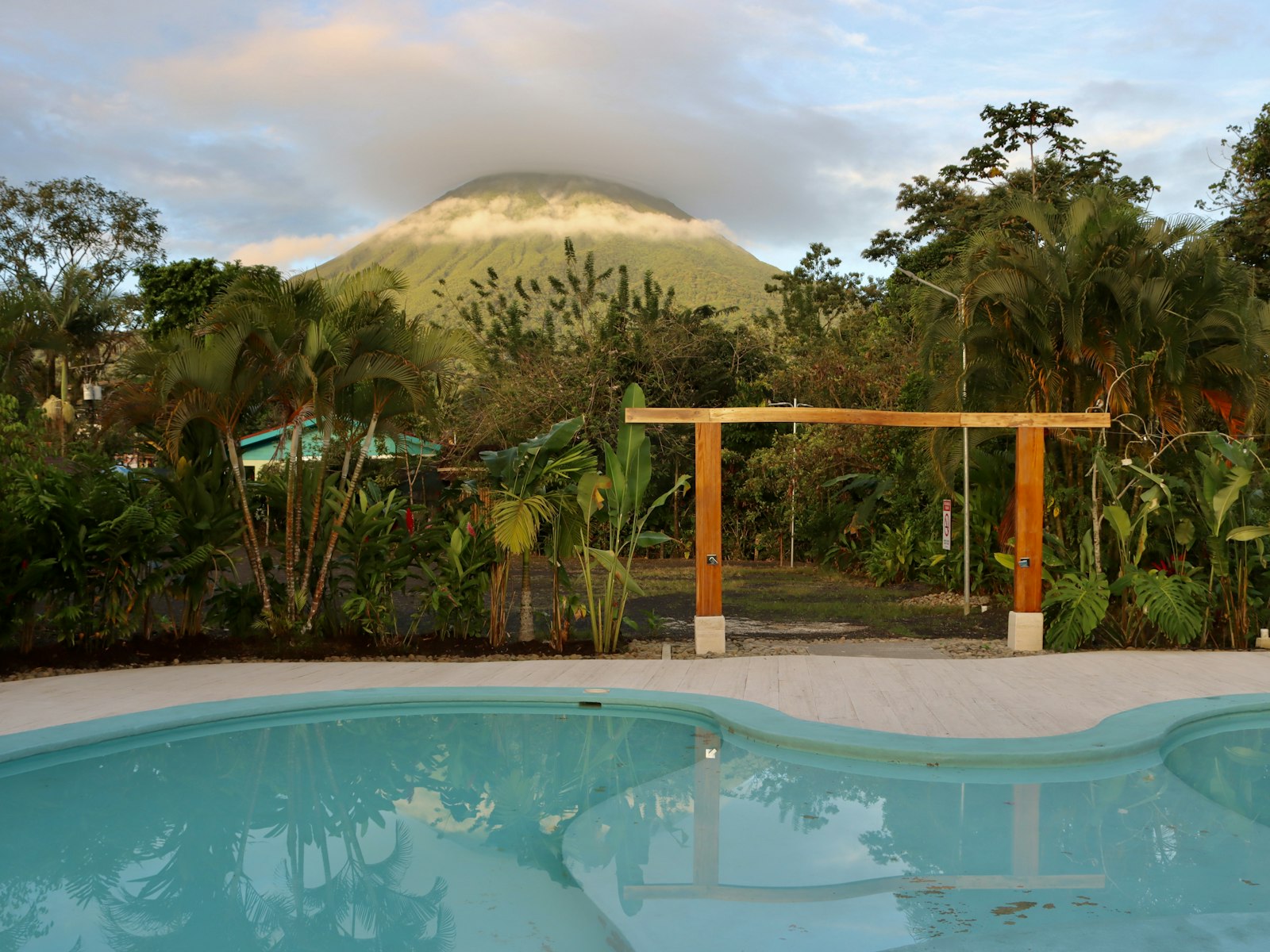 Hot springs pool with Arenal volcano view
